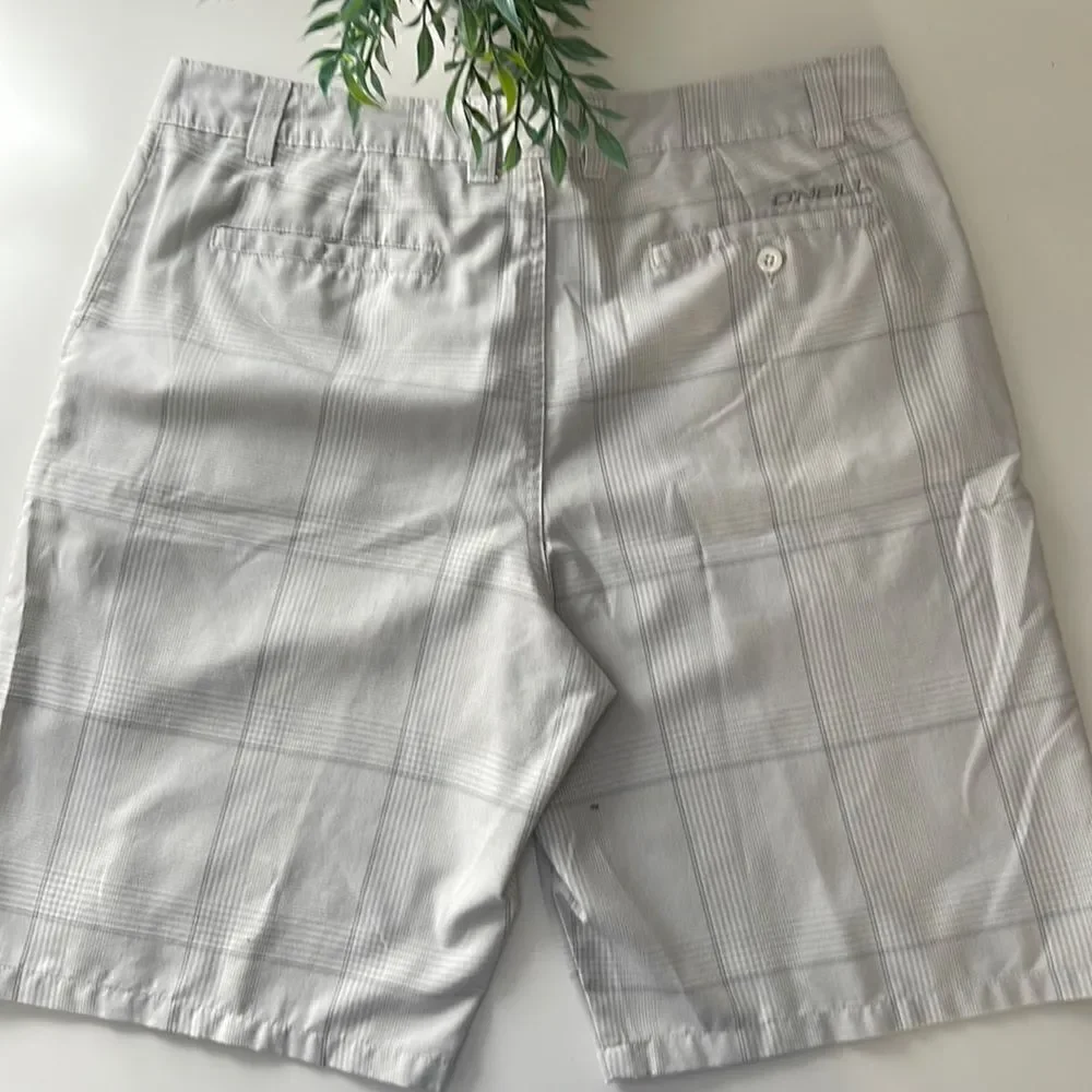 O’Neill golf shorts.  Size 36 waist.  Grey and white plaid.